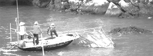 Locals fishing in Ha Long Bay