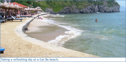 Taking a refreshing dip at another Cat Ba beach
