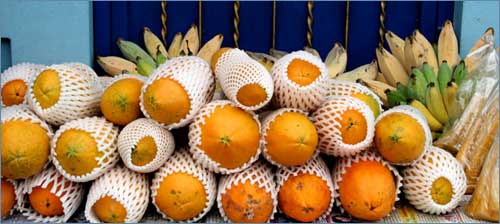 Fruit laid on in a streetside stall in Kanchanaburi Fruit laid on in a streetside stall in Kanchanaburi