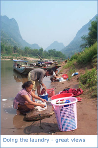 Doing the laundry with great Muang Ngoi views