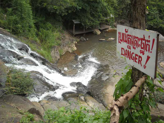 Read the sign! Waterfall outside Pailin.