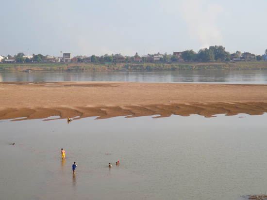Cooling off in the Mekong at the Vientiane Waterfront