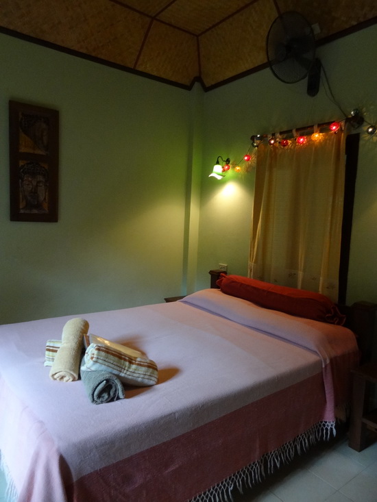 The Andaman Kitchen suite's cheerful bedroom.