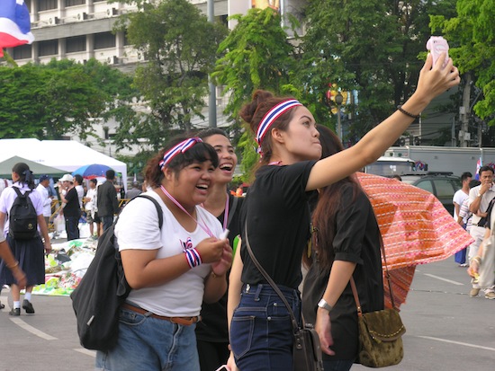 Frightening protester selfies at Democracy Monument.