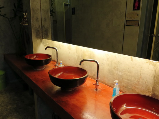 A resort-style bathroom design rarely seen in a cheap hostel.